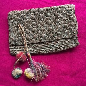 Woven Grass Clutch with pompoms